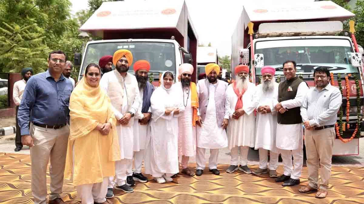 CM Mann flagged off the documentary vans