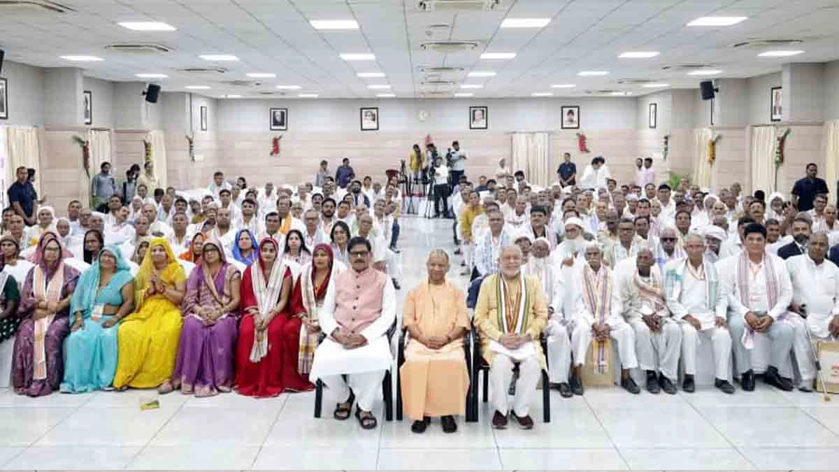 CM Yogi interacts with farmers who provided land for construction of Noida International Airport