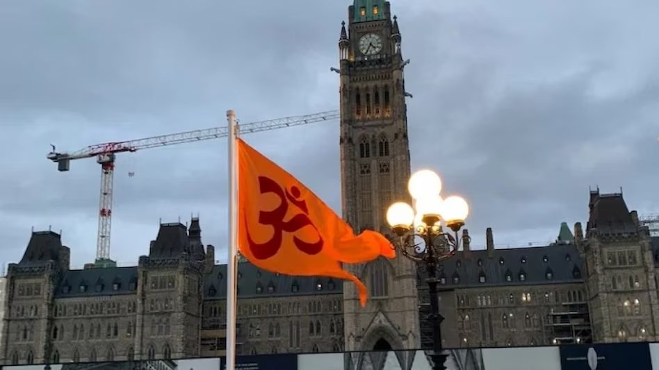 Saffron flag hoisted on Parliament Hill of Canada