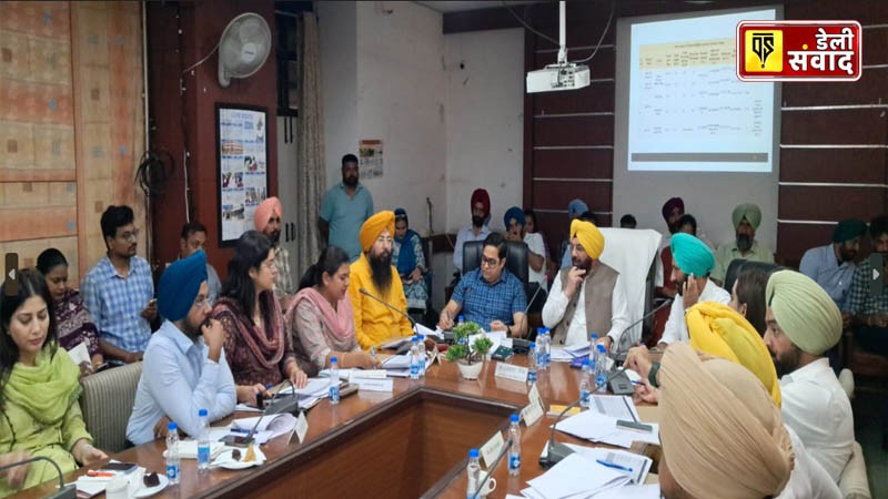 Cabinet minister Harbhajan Singh makes surprise visit to government schools and eats mid-day meal sitting with students