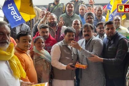 To celebrate the big victory in the by-election, MLA Raman Arora distributed laddus in his constituency and played drums