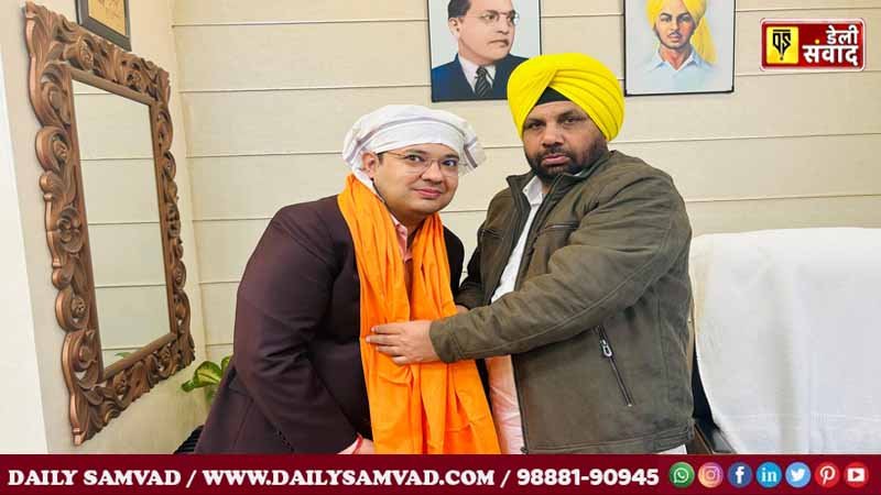 Harbhajan Singh ETO congratulated Executive Engineer Rohit Jindal on being selected as PCS officer