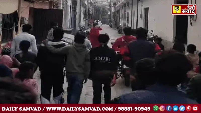 When the woman and her children were being paraded around the neighbourhood, some young men also followed them.