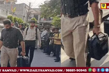 Members of the vigilance team taking away documents in a bag from inside the MLA's house.