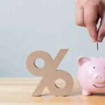 FD Interest Rates: एक्सिस बैंक के एफडी निवेशकों को झटका, बैंक ने ब्याज दर घटाई