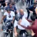 राहुल गांधी को जबरन किस करता युवक