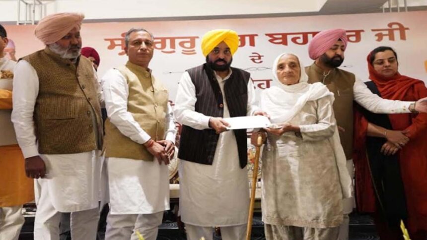 CM Mann distributed cheques