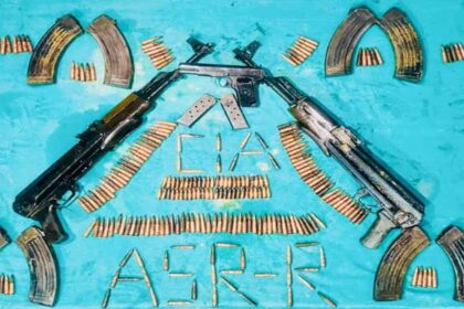 Two AK-series assault rifles and a modern pistol recovered