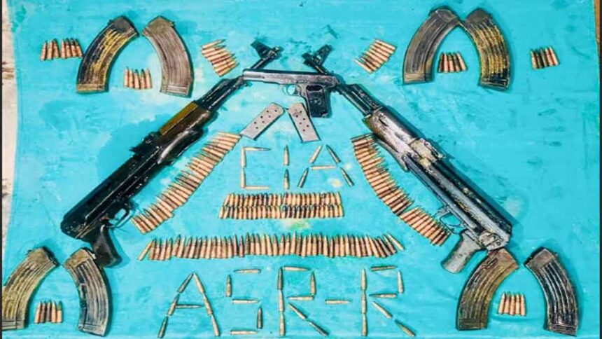 Two AK-series assault rifles and a modern pistol recovered