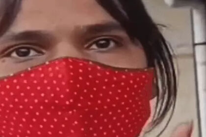 The transgender person is seen giving information about the employees' arbitrary behavior on the track