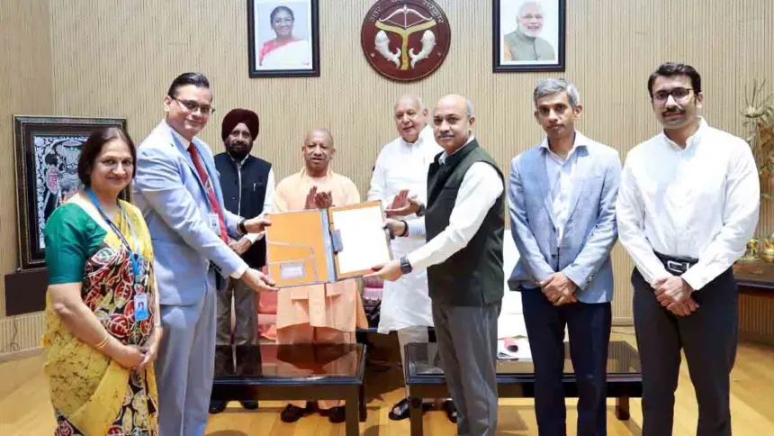 CM Yogi Hands Over Land Allotment Letter to BEL Chairman