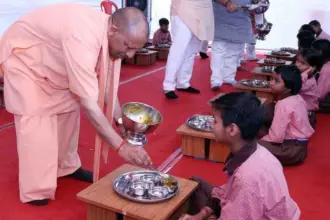 CM Yogi Serves Mid-Day Meal