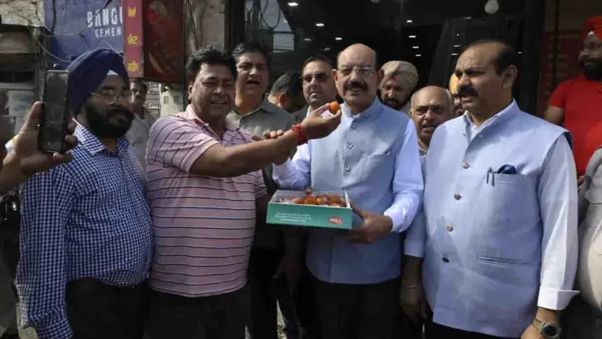 Residents of area honored Mohinder Bhagat upon the completion of road and sewerage works